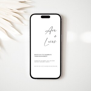 May include: A white smartphone mockup with a black screen displaying a wedding invitation for Ava and Lucas. The invitation includes the date, time, and location of the engagement party. The text reads: "Invite you to celebrate their engagement 7:30pm on Saturday 10th Jan 20XX Fox Trot Unicorn | Perth RSVP by 29-12-XX to Jayne on 0450 000 000"