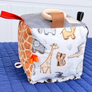 Blocco sensoriale per bambini Safari, cubo di attività in tessuto morbido