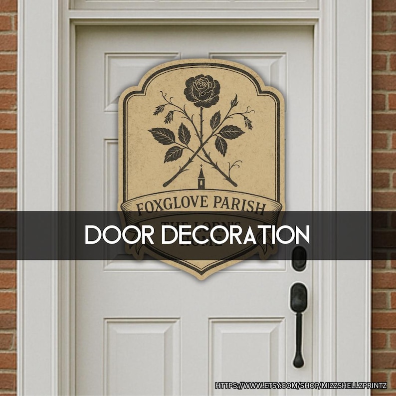 May include: A decorative door sign with a vintage design. The sign features a black rose and crossed stems with leaves, and the words "FOXGLOVE PARISH" and "DOOR DECORATION" in a serif font. The sign is mounted on a white door.