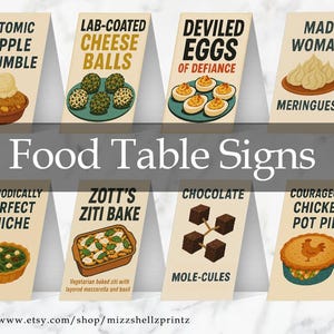 May include: A collection of eight food table signs with humorous names and illustrations. Each sign features a different dish, such as "Atomic Apple Crumble" and "Deviled Eggs of Defiance," with a playful font and design.