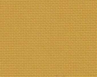 Può includere: Un primo piano di un tessuto tessuto con un colore giallo-oro testurizzato.
