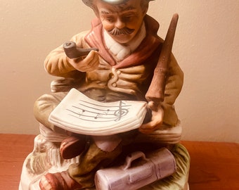 Vintage Large Figurine Old Man Sitting on a Bench With Pipe Reading Music