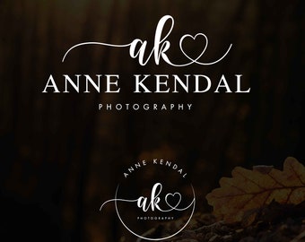 May include: A white logo with the initials "ak" in cursive script with a heart symbol. The text "Anne Kendal Photography" is below the initials.