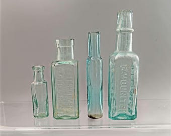 Set of 4 Antique Glass Bottles Victorian Apothecary and Condiment Lot Cottagecore Shelf Decor