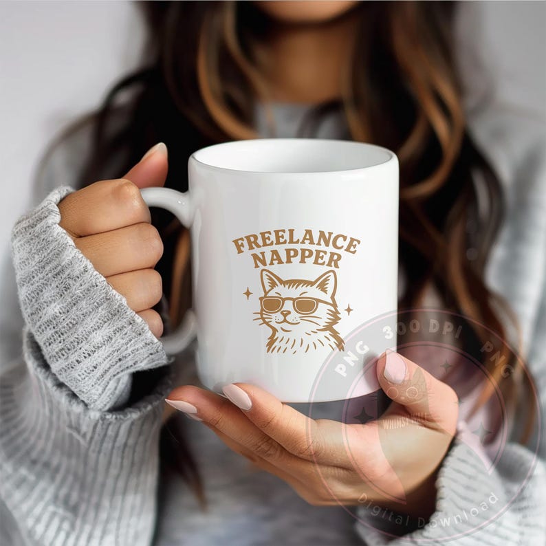 Relaxed digital cat design with “Freelance Napper” written above a chill feline in dark sunglasses. The cartoon has clean lines, sparkles for flair, and a transparent background. Great for DIY mugs, t-shirts, tote bags, or nap-themed gifts. PNG file is instantly downloadable. No physical product is included.