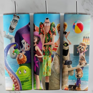 May include: A stainless steel tumbler featuring a colorful cartoon scene with various characters on a beach. The design includes a beach ball, ocean, and a cruise ship. The tumbler has a silver straw and a black lid.