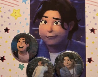 May include: An image featuring three round buttons with cartoon character images, alongside a larger image of the same character. The background is a colorful patterned paper with star shapes.