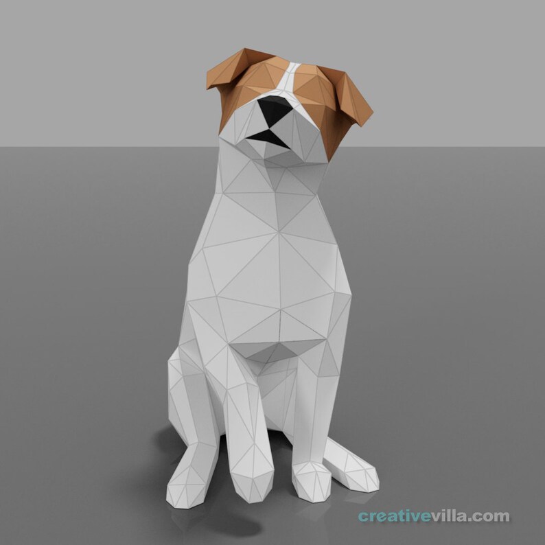 Pu&ograve; includere: Un modello di cane in origami di carta bianca e marrone, seduto con la testa inclinata verso l'alto. Il cane ha il naso nero e gli occhi neri.