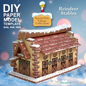 May include: A paper model template of a reindeer stable with a red roof, brick walls, and a sign that says "Reindeer Stable". The template is part of a North Pole Village Collection.