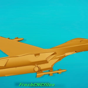 May include: A gold-colored model of a fighter jet with a single-seat cockpit and two missiles attached to the underside. The jet is positioned in a flying pose with the wings angled upwards.