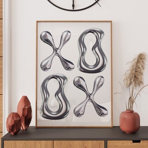 May include: A framed print with a white background and four silver abstract shapes. The shapes are in the form of an 'X' and an 'O'.