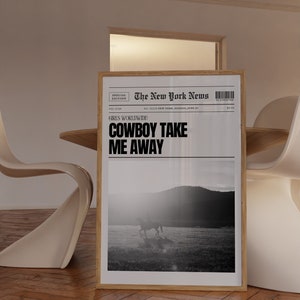 May include: A black and white newspaper print with the headline "COWBOY TAKE ME AWAY" and a photo of a person riding a horse in a field.