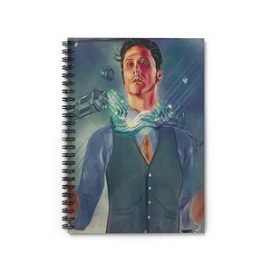 May include: Spiral-bound notebook featuring a stylized illustration of a person with a blue shirt, dark vest, and orange tie. The artwork includes a swirling blue and green design around the person's neck and a mechanical arm. The background is a mix of blues and greens.