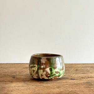 Vintage hand-made brown and green pottery bowl or planter, unsigned studio pottery with abstract designs and drip glazing, circa 1970s