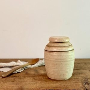 Vintage hand-turned ceramic pantry jar with lid, beige and brown studio pottery lidded jar, signed  Marguerite, from Quebec, circa 1960s-70s