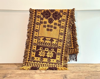 Vintage hand-woven wool table runner with bold brown and mustard yellow floral and geometric design, likely  Finnish, circa 1950s-60s
