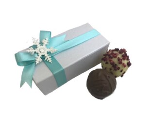 6 x 2 truffle box hand tied and decorated with a glitter snowflake, filled with Swiss Chocolate Truffles. Vegan option. Christmas favours