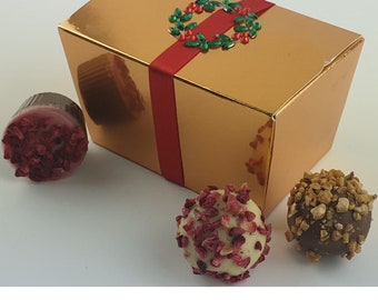 Mini gold ballotin box, decorated with a wreath & ribbon containing 12 x Swiss Chocolate Truffles. Vegan option available. Christmas gifts