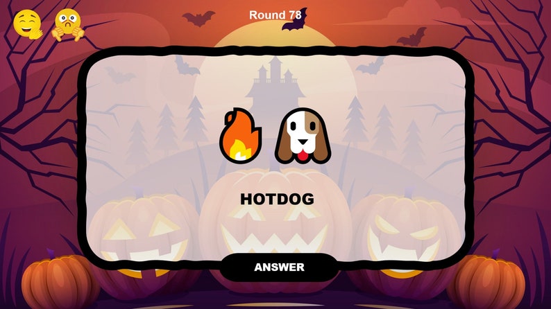 May include: A game screen with a Halloween theme. The word "HOTDOG" is displayed in the center of the screen. Two icons are shown above the word: a fire and a dog. The word "ANSWER" is displayed at the bottom of the screen.