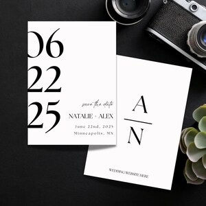 May include: A black and white save the date card with the date 06 22 25, the names Natalie and Alex, and the text "save the date". The card also includes the text "June 22nd, 2025" and "Minneapolis, MN". A second card with the initials A and N separated by a line and the text "WEDDING WEBSITE HERE" is also shown.