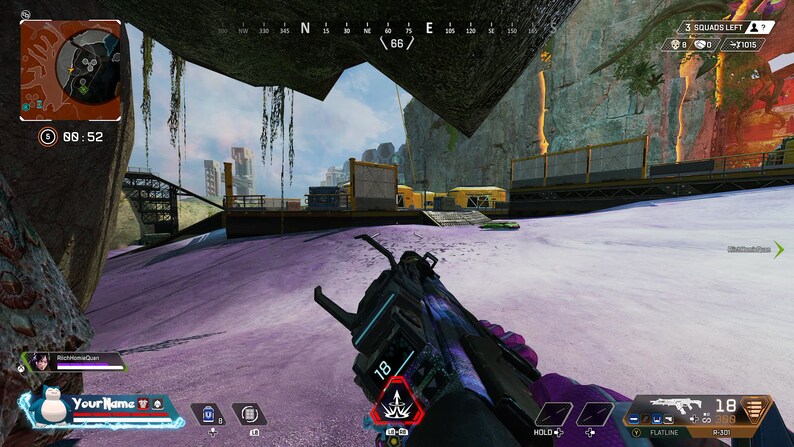 May include: A first-person view of a video game, showing a player holding a black and purple gun with a digital display that reads "18". The player is in a snowy, mountainous environment with a rocky cliff face in the background.
