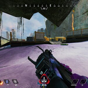 May include: A first-person view of a video game, showing a player holding a purple and black gun with a digital display. The player is in a snowy, mountainous environment with buildings in the distance. The game's interface shows the player's health, ammo, and other information. The text "3 SQUADS LEFT" and "71015" are visible in the upper right corner of the screen.