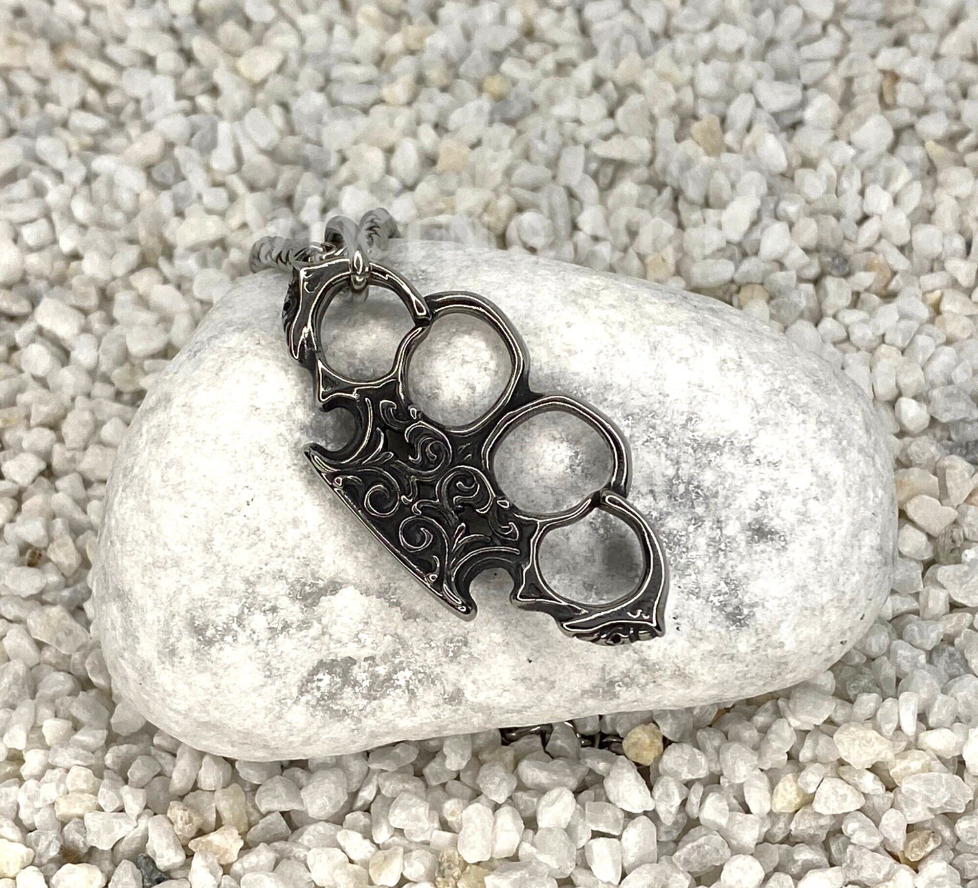 Brass knuckles sale necklace hot topic