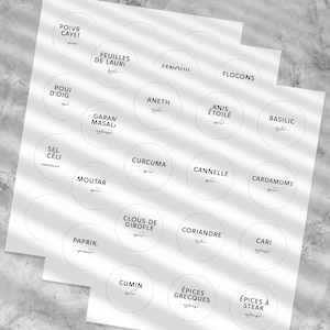 May include: Printable spice jar labels with French names for spices, including basil, cardamom, cinnamon, cloves, coriander, cumin, curry, fennel, garlic, garam masala, ginger, laurel leaves, mustard, paprika, pepper, salt, star anise, and turmeric.