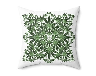 May include: White throw pillow with a green marijuana leaf pattern. The leaves are arranged in a symmetrical design.