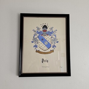 May include: A framed coat of arms illustration featuring a shield with a blue diagonal stripe, a gold star, and a compass symbol on a cream background. The crest includes a helmet and bees, with the name Petty and the text "Ad astra per aspera" below.