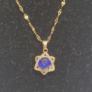 Stainless steel gold and blue cubic zerconia star of David necklace