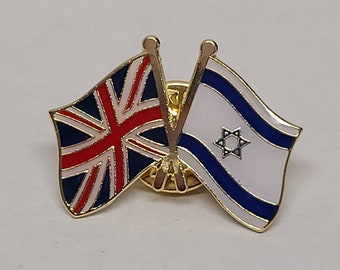 May include: A gold pin with a crossed flag design. The flags are the United Kingdom flag and the flag of Israel.
