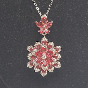 She is a flower of Israel pink cubic zerconia necklace