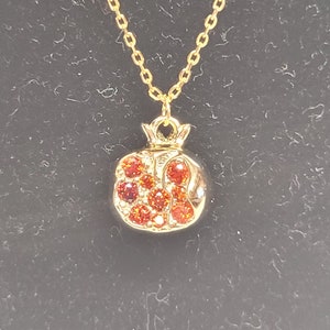 Small gold and red pomegranate necklace