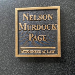 3D printed Nelson, Murdock and page sign