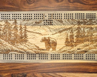 Bear walking through a valley with trees 4 Track Cribbage Board - Laser engraved