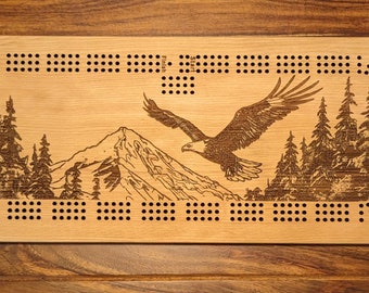 Bald Eagle flying over a valley, 3 Track Cribbage Board - Laser engraved