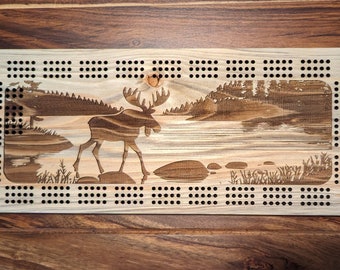 Moose walking in a river, 3 Track Cribbage Board - Laser engraved
