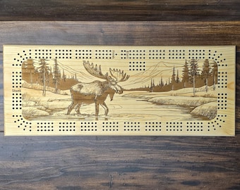 Moose walking in a river, 3 Track Cribbage Board