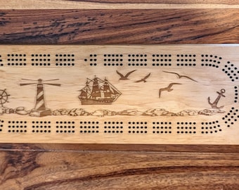 Nautical themed  3 Track Cribbage Board  with a lighthouse and ship on the ocean - Laser engraved