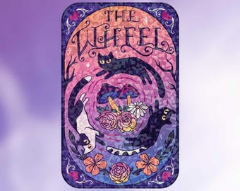 May include: A rectangular card featuring the text THE WHEEL at the top. The illustration depicts three cats arranged in a circular motion around a central cluster of colourful mushrooms and flowers, set against a purple and pink gradient background.