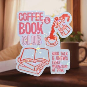 May include: A holographic sticker featuring red line art of a moka pot pouring coffee into a cup, an open book, and the text COFFEE & BOOK CLUB and BOOK TALK & BREWS EVERY WEDNESDAY AT 7PM. The design has a light blue background with star-shaped sparkles.