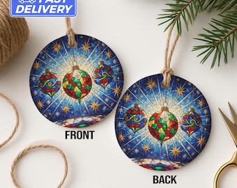 May include: Round Christmas ornament with a stained-glass design. The ornament features a blue background with gold stars and three colorful baubles. The front of the ornament is labeled "FRONT" and the back is labeled "BACK". A jute string is attached for hanging.