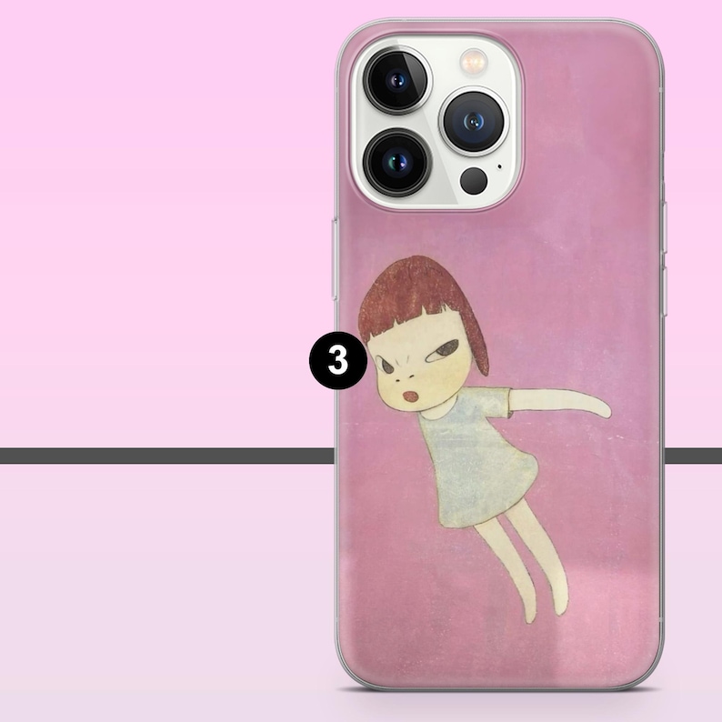 May include: Pink phone case featuring a cartoon illustration of a girl with a stern expression. The girl has short brown hair and is wearing a light blue dress. The phone case has a clear border and a pink background.