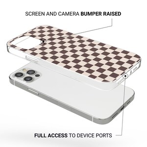 May include: A clear phone case with a brown and beige checkered pattern. The case is designed to protect the screen and camera with a raised bumper. The text "SCREEN AND CAMERA BUMPER RAISED" and "FULL ACCESS TO DEVICE PORTS" are visible.