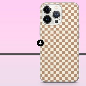 May include: A phone case with a tan and cream checkerboard pattern. The case has a clear border and a camera cutout. The number 4 is in a black circle on the side of the case.
