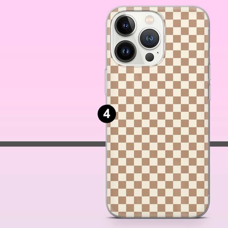 May include: A phone case with a tan and cream checkerboard pattern. The case has a clear border and a camera cutout. The number 4 is in a black circle on the side of the case.