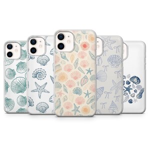 May include: Five phone cases showcasing seashell and starfish patterns. The cases display a variety of colours, such as teal, pink, and beige, with detailed illustrations of marine life. The cases are designed to fit a smartphone.