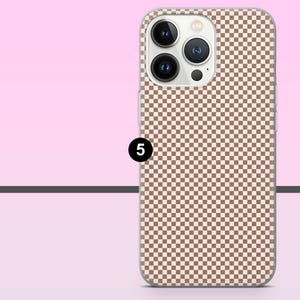 May include: A phone case with a brown and white checkered pattern. The case has a clear border and features a camera module with three lenses. The number "5" is printed on the side of the case.