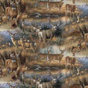 May include: A repeating fabric pattern featuring multiple brown deer and bucks with antlers standing in a grassy landscape with a stream, trees, and rocky terrain. The scene is rendered in natural earth tones of brown, tan, and muted green.